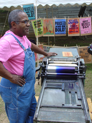 Alabama Book Festival Amos Kennedy talking about printing presses.